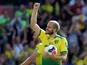 Norwich City's Teemu Pukki celebrates his hat-trick with the match ball after the match against Newcastle on August 17, 2019