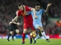 James Milner tussles with Raheem Sterling during the Premier League game between Liverpool and Manchester City on December 31, 2016