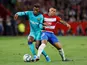 Barcelona's Nelson Semedo in action with Granada's Darwin Machis in La Liga on September 21, 2019