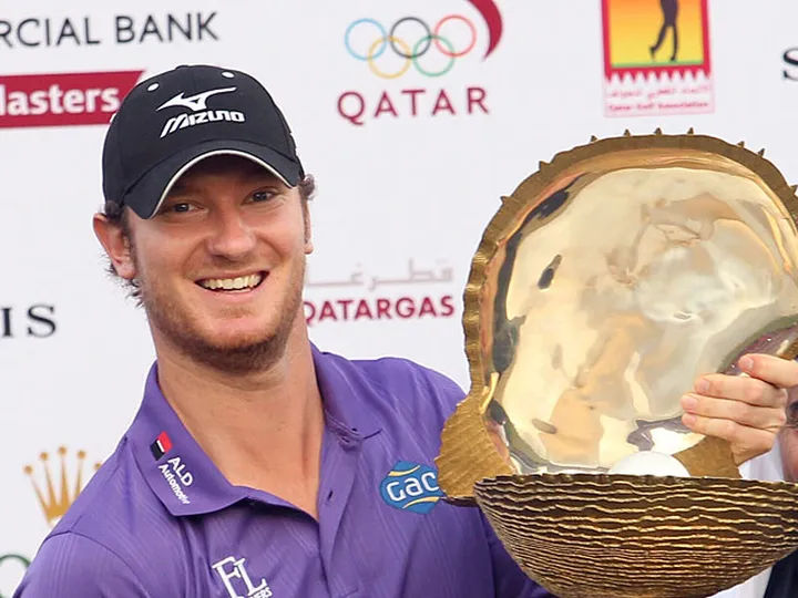 Wood claims Qatar crown