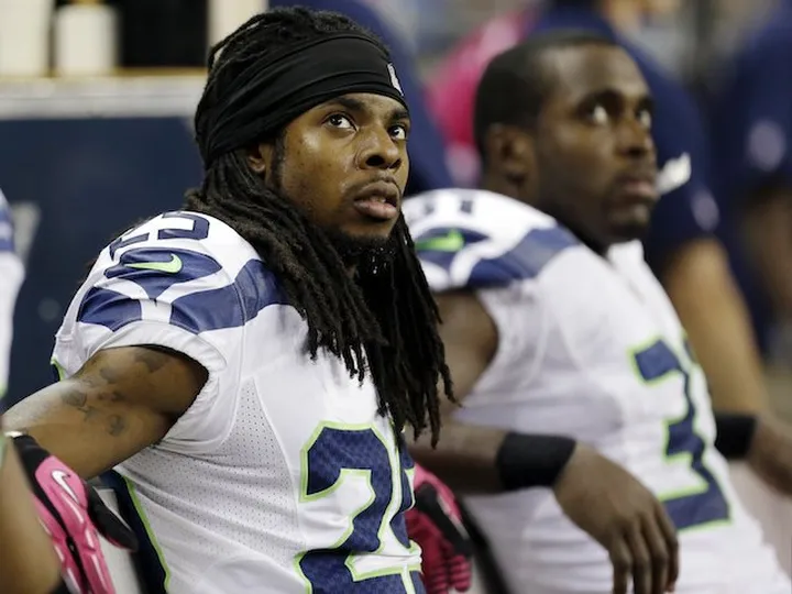 Sherman: 'I have no contact with ex-coach Harbaugh'