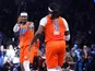 Oklahoma City Thunder's Shai Gilgeous-Alexander gestures towards guard Luguentz Dort