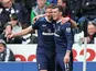 Gareth Bale is congratulated by team mate Jan Vertonghen after scoring his team's second against Swansea on March 30, 2013