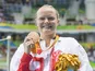 Susannah Rodgers poses with her bronze medal after the women's 50m freestyle S7 event at the Paralympic Games in Rio de Janeiro on September 9, 2016