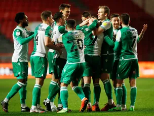 Millwall end winless run with victory at 10-man Bristol City