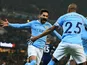 Ilkay Gundogan celebrates scoring the opener with Fernandinho during the Premier League game between Manchester City and Tottenham Hotspur on December 16, 2017