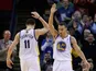 Stephen Curry #30 of the Golden State Warriors is congratulated by Klay Thompson #11 after Curry made a basket and was fouled during their game against the Oklahoma City Thunder at Oracle Arena on January 23, 2013