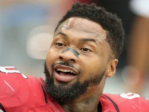 Arizona defensive captain Darnell Dockett on the sidelines against Detroit on September 15, 2013