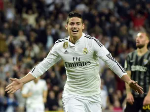 Madrid hang on to beat Malaga