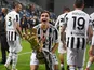 Juventus' Federico Chiesa celebrates with the Coppa Italia trophy on May 19, 2021