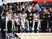 San Antonio Spurs players on the bench