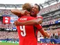 England's Harry Kane celebrates with teammate Jude Bellingham