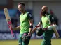 South Africa's Faf du Plessis and Hashim Amla walk off after winning the match against Sri Lanka on June 28, 2019