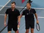 Britain's Dan Evans and Jamie Murray celebrate after winning their doubles group stage match against Germany's Alexander Zverev and Kevin Krawietz on January 2, 2022