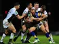 Leeds Rhinos' Jamie Jones-Buchanan is held by the Hull FC defence in the Super League match on February 1, 2013