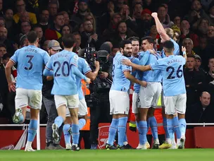 Man City see off Arsenal to go top of Premier League