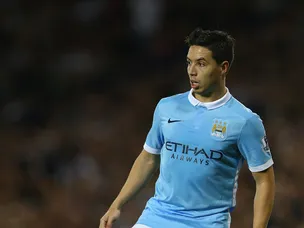 Man City's Samir Nasri dyes hair blue