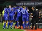 Leicester City's Wesley Fofana celebrates scoring their first goal with teammates and manager Brendan Rodgers on March 17, 2022