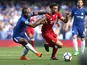 Victor Moses battles with Trent Alexander-Arnold during the Premier League game between Chelsea and Liverpool on May 6, 2018