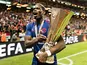 Manchester United's Paul Pogba celebrates with the Europa League trophy on May 24, 2017