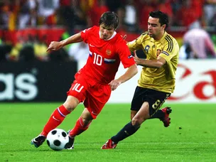 Xavi relieved after narrow Spain win