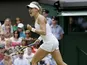 Eugenie Bouchard of Canada celebrates after beating Ana Ivanovic of Serbia in a Women's second round singles match on June 26, 2013