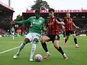 Anthony Elanga (20) of Newcastle United on the attack battles for possession with Marcos Senesi (5) of AFC Bournemouth on September 21, 2025