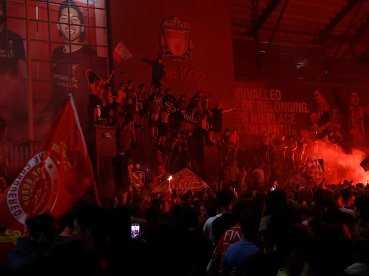 Liverpool mayor urges "intoxicated" fans to go home as Liver building hit by firework