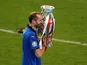Italy's Giorgio Chiellini celebrates with the Euro 2020 trophy on July 11, 2021
