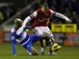Kieran Gibbs of Arsenal holds off Jimmy Kebe of Reading on December 17, 2012