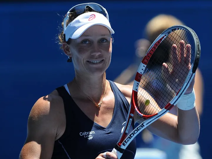 Stosur battles past plucky Glushko