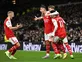 Arsenal stroll past Tottenham to go eight points clear