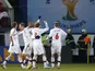 Denmark's players celebrate after a goal during their World Cup qualifiying match against the Czech Republic on March 22, 2013