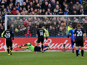 Wigan edge past Macclesfield 