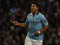 Sergio Aguero celebrates scoring his first for City on November 17, 2012