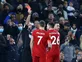 Ten-man Liverpool drop points in Tottenham thriller