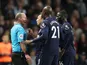 West Ham United's Mark Noble and Angelo Ogbonna protest as teammate Arthur Masuaku is sent off by referee Mike Dean on September 16, 2019