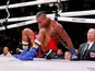 Patrick Day (red trunks) reacts after getting knocked down by Charles Conwell (not pictured) during a USBA Super-Welterweight boxing match at Wintrust Arena on October 13, 2019