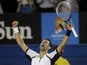 Novak Djokovic celebrates defeating Tomas Berdych at the Australian Open tennis championship on January 22, 2013
