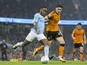 Raheem Sterling and Ruben Vinagre in action during the EFL Cup game between Manchester City and Wolverhampton Wanderers on October 24, 2017