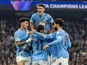 Phil Foden celebrates with teammates after Manchester City score on November 5, 2025