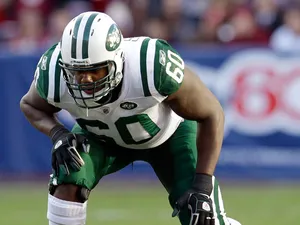 'Brickashaw Ferguson #60 of the New York Jets lines up against the Washington Redskins defense at FedExField on December 4, 2011