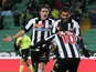 Udinese's Danilo Larangeira celebrates with team mates after scoring his team's third goal on December 2, 2012