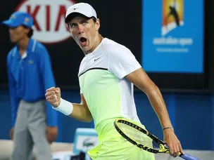 Pouille through to first grand slam semi with surprise win over Raonic