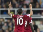 Liverpool run riot to clinch top spot
