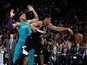 Milwaukee Bucks' Giannis Antetokounmpo in action with Charlotte Hornets' Miles Bridges on January 24, 2020