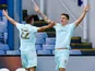 Jordan Hugill celebrates scoring for QPR with Angel Rangel on August 31, 2019