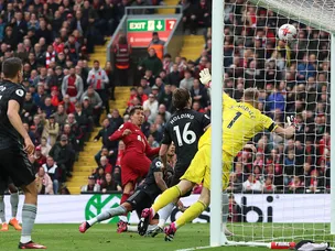Liverpool net late equaliser in thrilling draw with leaders Arsenal