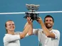 Czech Republic's Barbora Krejcikova and Croatia's Nikola Mektic celebrate with the trophy after winning their match against Bethanie Mattek-Sands of the U.S. and Britain's Jamie Murray on February 1, 2020