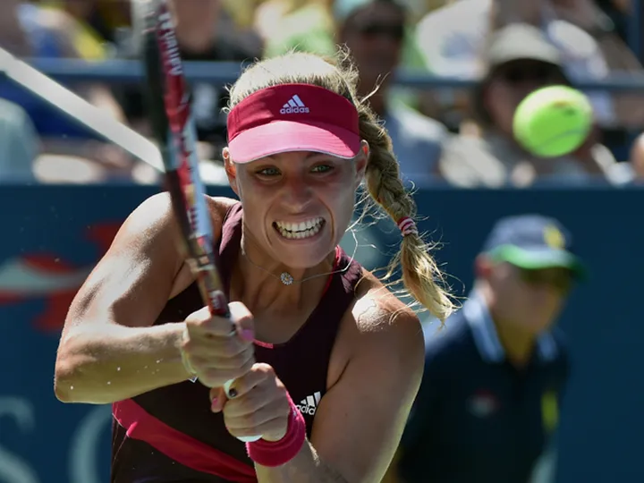 Kerber cruises past Wozniacki in Beijing